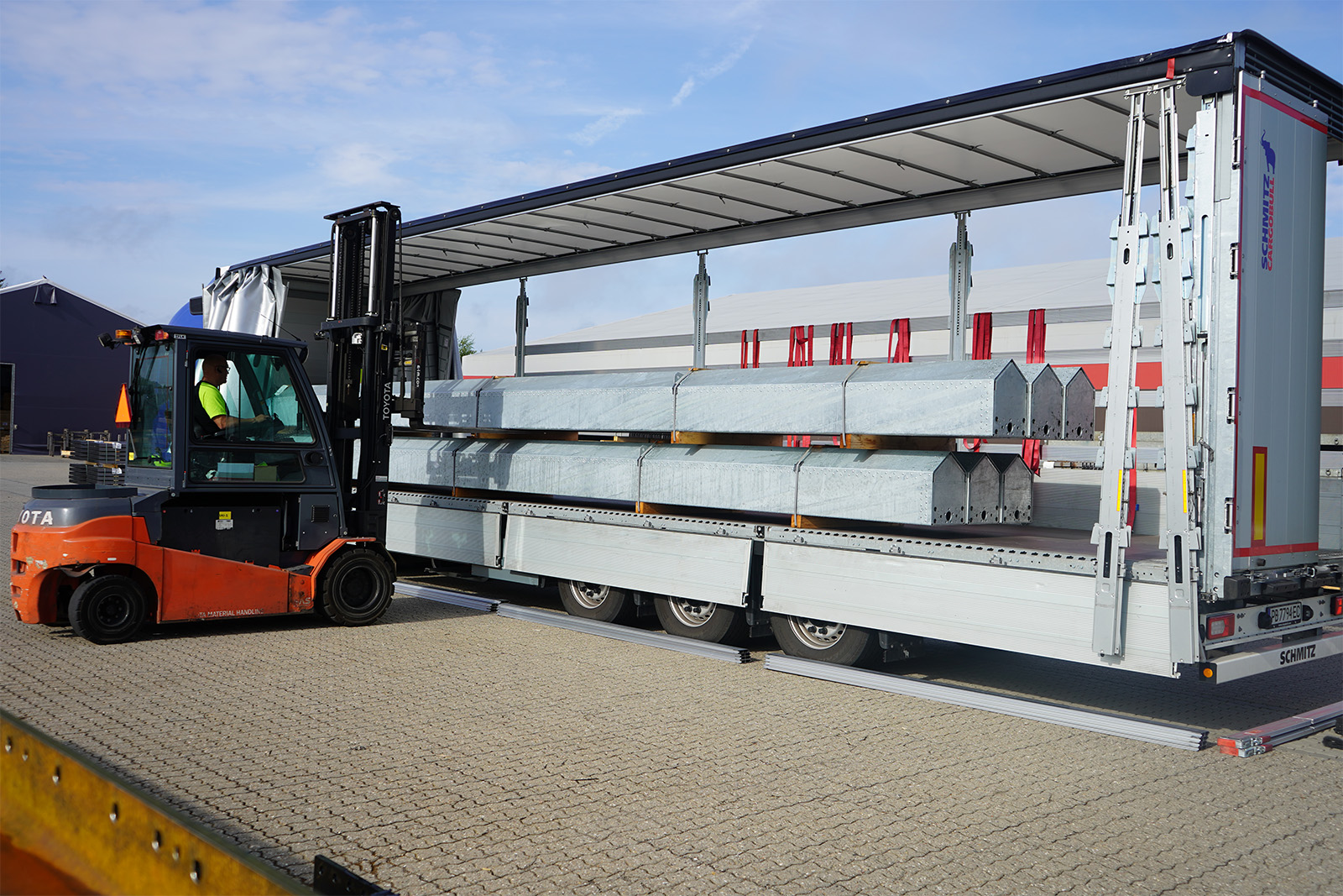 Steel structures being loaded prior to shipment to Greece. 