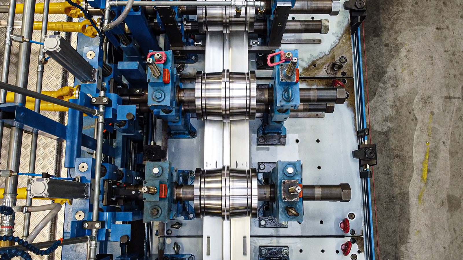 Roll forming line manufacturing steel profiles seen from above 
