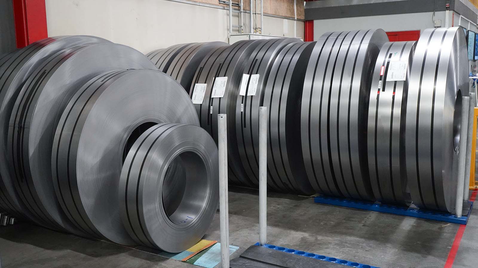 Narrow coils and steel strips are stored and ready for further processing as needed
